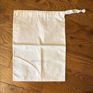 Jimmy Choo Cream storage bag Elegant and Versatile
